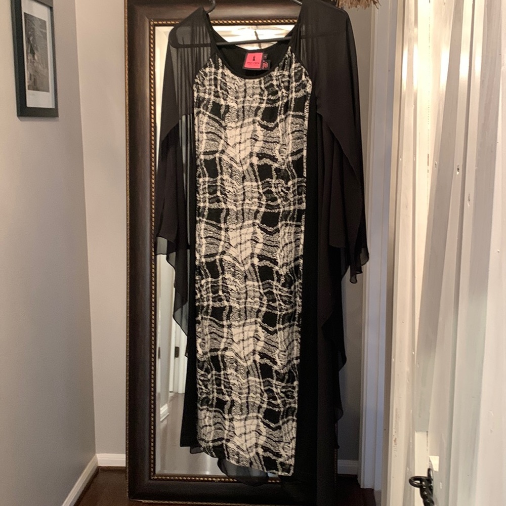 Caped, black and white, plaid, boutique dress by Simon Chang.